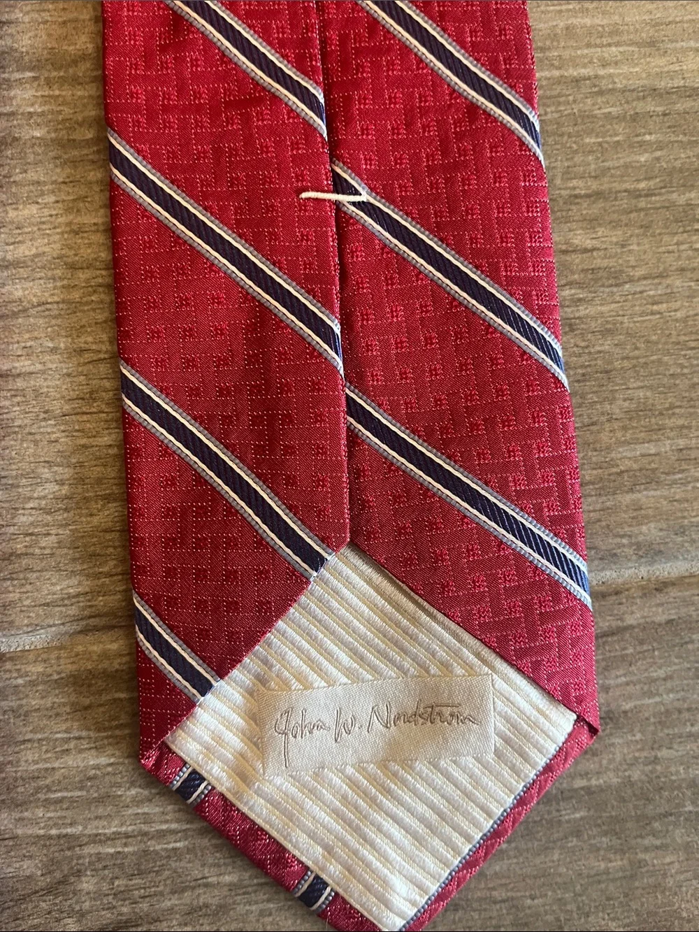 John W. Nordstrom bold red